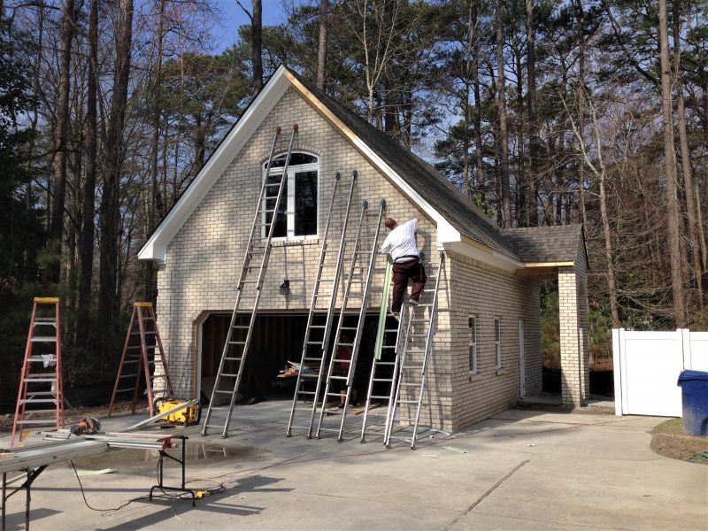 Vladamir During Trim and Soffit.JPG