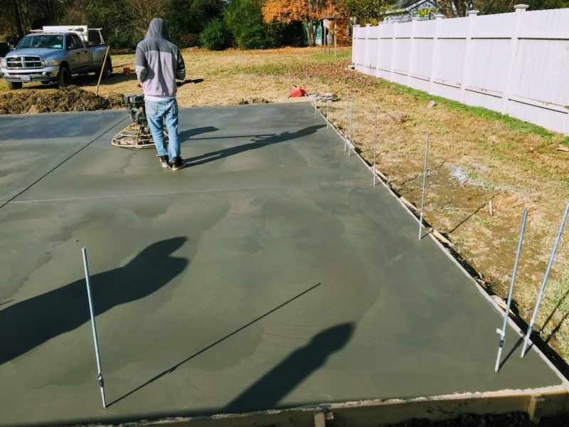 Tall Barn Slab Troweling.jpg